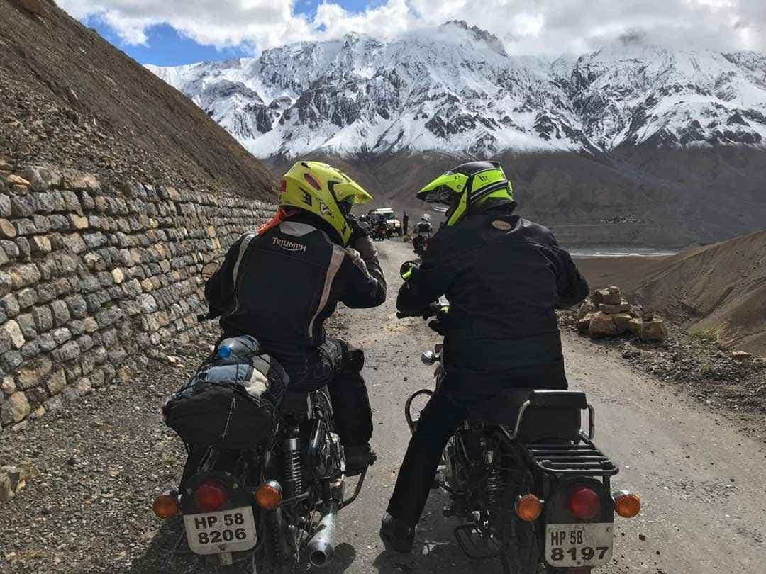 Motorcycle tour through high mountain passes and valleys